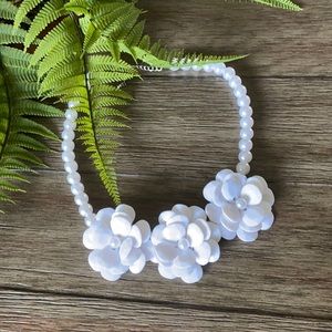 White pearl and floral statement necklace